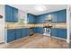 Bright kitchen with updated stainless steel appliances, ample storage, and granite countertops at 512 Red Oak Ct, Tega Cay, SC 29708
