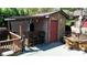 Quaint outdoor bar area with seating, perfect for entertaining guests poolside at 7424 Windy Pine Cir, Denver, NC 28037