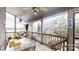 Screened-in porch with a ceiling fan, seating, and a view of the lake at 7424 Windy Pine Cir, Denver, NC 28037