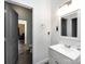 Clean bathroom view with modern fixtures, a vanity sink, and a view to a bedroom beyond at 7545 Brancy St, Kannapolis, NC 28081