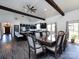 Open-concept dining room and kitchen featuring vaulted ceiling with exposed beams and an open concept floorplan at 7545 Brancy St, Kannapolis, NC 28081