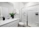 Modern bathroom features a sleek vanity, frameless glass shower, and stylish fixtures for a spa-like experience at 7730 Woolsey Dr, Gastonia, NC 28056