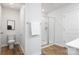 Clean bathroom with a toilet, shower, and modern fixtures at 7730 Woolsey Dr, Gastonia, NC 28056