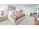 Comfortable bedroom has a serene bed, stylish decor, and soft natural light for a peaceful atmosphere at 7730 Woolsey Dr, Gastonia, NC 28056