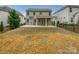 Large backyard with a covered patio and privacy fence at 78162 Rillstone Dr, Lancaster, SC 29720