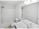 Clean, white bathroom with a combined shower and tub at 78162 Rillstone Dr, Lancaster, SC 29720