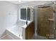 Bathroom with soaking tub and shower at 78162 Rillstone Dr, Lancaster, SC 29720