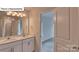 Bathroom with double sink vanity, lots of counter space and great lighting at 8067 Kennesaw Dr, Gastonia, NC 28056
