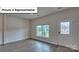 Inviting entryway featuring stylish flooring, a decorative glass door, and ample natural light at 8067 Kennesaw Dr, Gastonia, NC 28056