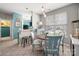 Cozy dining area with a round table, bright window, and stylish blue accents at 969 Copperstone Ln, Fort Mill, SC 29708