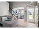 Inviting entryway with tile flooring, stairs, and a view of the dining area at 969 Copperstone Ln, Fort Mill, SC 29708