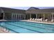 Community swimming pool with ample deck space and lounge chairs for relaxing at 969 Copperstone Ln, Fort Mill, SC 29708
