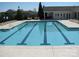 Community swimming pool with marked lanes, lounge chairs, and nearby clubhouse providing relaxation and recreation at 969 Copperstone Ln, Fort Mill, SC 29708