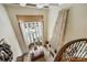 Bright office space with a large window overlooking the pool and a stone fireplace at 1012 Clover Crest Ln, Weddington, NC 28104
