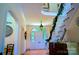 Welcoming foyer with hardwood floors, staircase, and decorative accents, creating a grand entrance at 1035 Pee Dee Ave, Albemarle, NC 28001