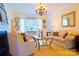 Inviting living room with a fireplace, neutral colors, and plenty of natural light at 1035 Pee Dee Ave, Albemarle, NC 28001