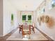 Inviting dining room featuring modern decor and a view of the backyard at 1046 Mapletree Ln, Indian Trail, NC 28079