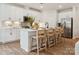 Bright modern kitchen featuring white cabinets, a subway tile backsplash, and stainless steel appliances at 1046 Mapletree Ln, Indian Trail, NC 28079