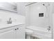 A well-lit bathroom features a shower over tub and a white vanity cabinet at 105 Deaver St, Chester, SC 29706