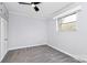 Bedroom with neutral carpet, ceiling fan, and plenty of natural light at 105 Deaver St, Chester, SC 29706