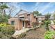 Side angle view of a brick home with mature landscaping and an entrance porch at 105 Deaver St, Chester, SC 29706