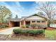 Charming brick home with a well-manicured front yard and an attached carport at 105 Deaver St, Chester, SC 29706