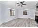 Living room features a large brick fireplace and plenty of natural light at 105 Deaver St, Chester, SC 29706