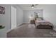 Bright bedroom with a cozy bed, soft rug, and a tranquil atmosphere for restful nights at 10904 Kilkenny Dr, Matthews, NC 28105
