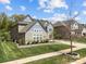 Charming home with a well-manicured lawn, and a beautiful garden, and a long driveway at 10904 Kilkenny Dr, Matthews, NC 28105