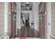 Inviting foyer with hardwood floors, high ceilings, and a view into the living room and staircase at 10904 Kilkenny Dr, Matthews, NC 28105