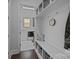 Mud room featuring built-in storage, bench, and access to laundry area at 10904 Kilkenny Dr, Matthews, NC 28105