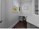 Comfortable home office with built-in desk and ample natural light at 10904 Kilkenny Dr, Matthews, NC 28105