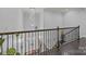 Second floor view of stairs and chandelier at 10904 Kilkenny Dr, Matthews, NC 28105