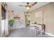Inviting room featuring a decorative accent wall, complemented by natural light from the window, and a ceiling fan at 115 Oak Creek Rd, Statesville, NC 28625