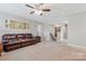 Spacious loft area, perfect for entertaining or relaxing, with comfortable seating at 116 Rainbow Trout Trl, Fort Mill, SC 29715