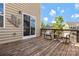 Relaxing patio with weathered wood and chairs offers an inviting outdoor space to enjoy sunny days at 116 Rainbow Trout Trl, Fort Mill, SC 29715