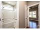 Bathroom featuring tub-shower combo with granite vanity at 1314 39Th Street Sw Cir, Hickory, NC 28602