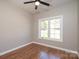Bedroom features natural light from a window and wood-look flooring at 1314 39Th Street Sw Cir, Hickory, NC 28602