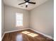 Bedroom features wood-look flooring and plenty of natural light at 1314 39Th Street Sw Cir, Hickory, NC 28602