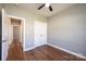 Bedroom with ceiling fan, wood-look floors, and a closet at 1314 39Th Street Sw Cir, Hickory, NC 28602