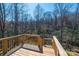 Wooden deck with railing offering scenic views of the woods at 1314 39Th Street Sw Cir, Hickory, NC 28602