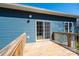 Spacious deck with railing and sliding glass doors to the house at 1314 39Th Street Sw Cir, Hickory, NC 28602