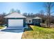 Inviting single-story home with a convenient two-car garage, surrounded by a lush green lawn at 1314 39Th Street Sw Cir, Hickory, NC 28602