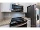 Kitchen with stainless steel appliances and granite countertops at 1314 39Th Street Sw Cir, Hickory, NC 28602