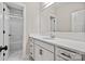 This is a bathroom with white cabinets and marble flooring at 13712 Bonnerby Ct, Huntersville, NC 28078