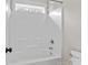 This is a simple shower and bath combination with white walls at 13712 Bonnerby Ct, Huntersville, NC 28078