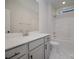 Bathroom showcasing a bathtub with shower, toilet, vanity with bright countertop and neutral cabinets at 1378 Cedardale Ln, Denver, NC 28037