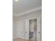 Bedroom doorway leading to a modern ensuite bathroom at 1378 Cedardale Ln, Denver, NC 28037