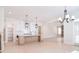 Spacious kitchen with stainless appliances, a large island, and a view of the living area at 1378 Cedardale Ln, Denver, NC 28037