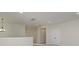 Bright living room area featuring recessed lighting, neutral walls, and carpeted floors at 1378 Cedardale Ln, Denver, NC 28037